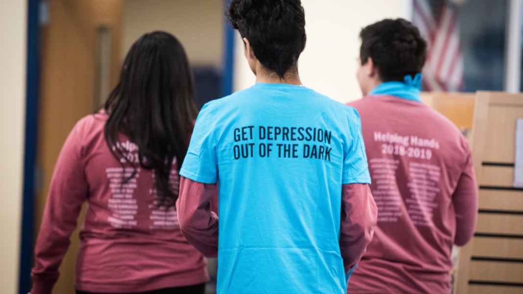 Teens where shirts that support mental health wellness and depression awareness
