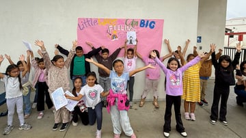 Kindergarten students happy to express feelings.