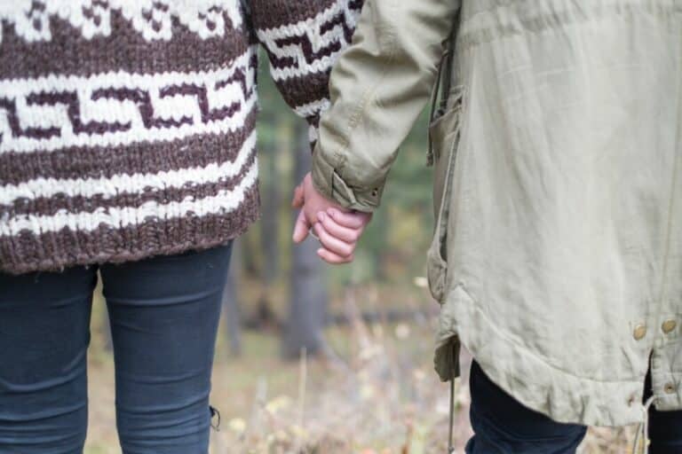 two people holding hands