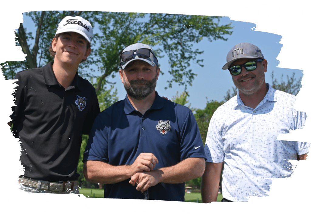 three men smiling on the golf course