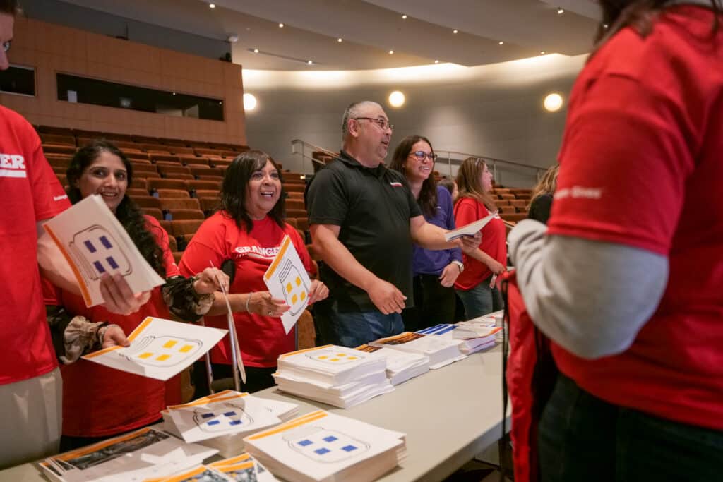 Erika's Lighthouse and Grainger volunteers creating mental health tool kits.
